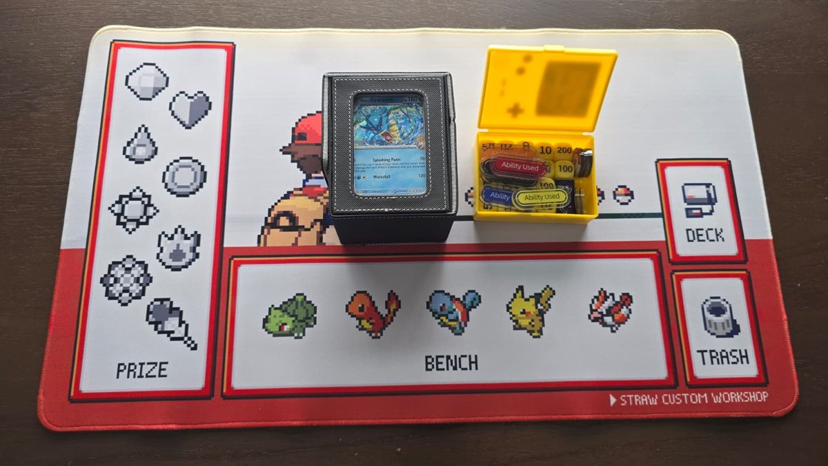 A deck box next to a small yellow case holding Ability Used markers